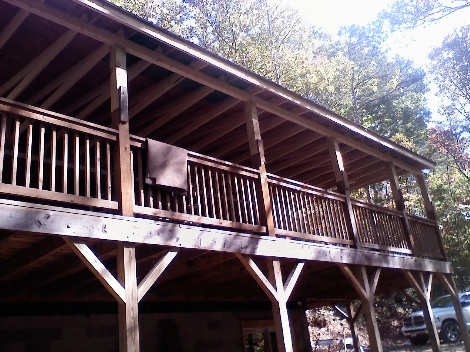 Timber framing under a new elevated porch and deck — Roof Leak Repair in Arizona City by Roofing Brothers